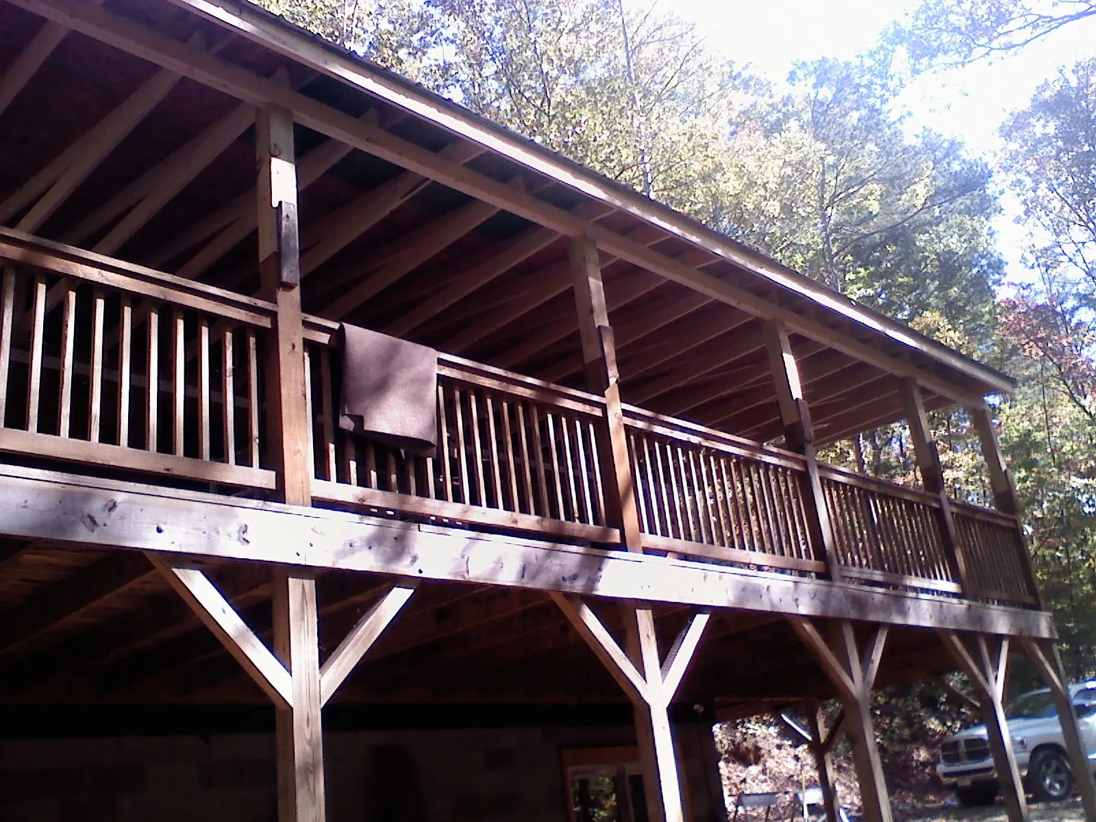 Timber framing under a new elevated porch and deck — Roof Leak Repair in College Corner by Roofing Brothers